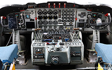 Lockheed L.188AF Electra | C-FZCS | Air Spray  |  View of the cockpit. The iPad is used for navigational purposes | CYRM 21.07.2023