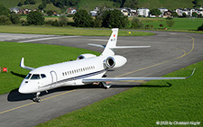 Dassault Falcon 6X | HB-JTO | untitled (Cat Aviation)  |  This Dassault Falcon 6 is taxing in front of the former alert shelters at Buochs. | BUOCHS (LSZC/BXO) 25.08.2025