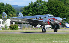 Lockheed L.12A Electra Junior | NC18125 | untitled (Fliegermuseum Altenrhein)  |  This Lockheed L.12A Electra Junior is touching down on runway 08 at Birrfeld. | LSZF 28.06.2025