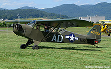 Piper L-4H Grasshopper | HB-OSM | private  |  This Piper L-4H Grasshopper is seen here taxing towards the visitors parking. | LSZF 28.06.2025